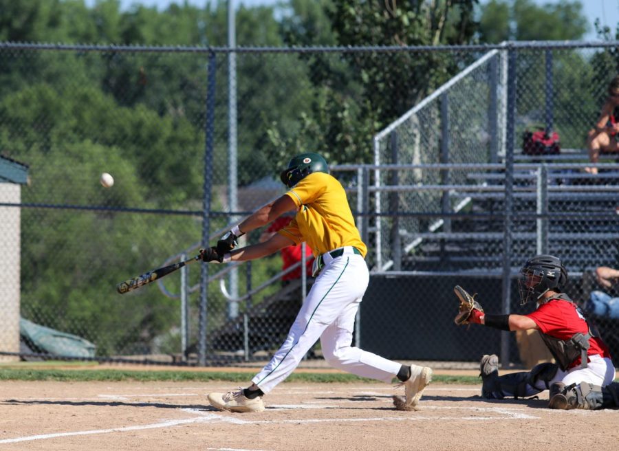 Mitch Frey 23 swings at a ball during the second game against Cedar Falls on June 17, 2022.