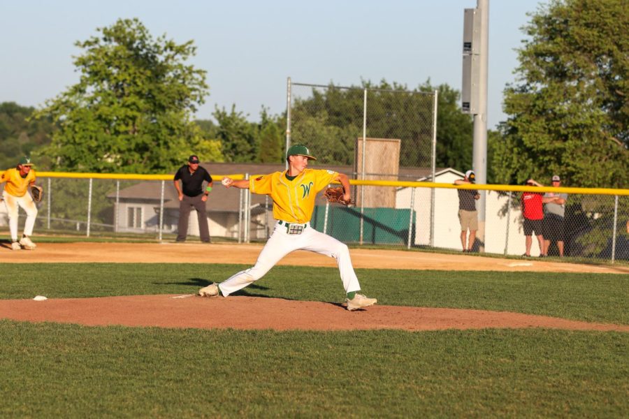 Ben Hoefer 23 throws out a pitch during the second game against Cedar Falls on June 17, 2022. 