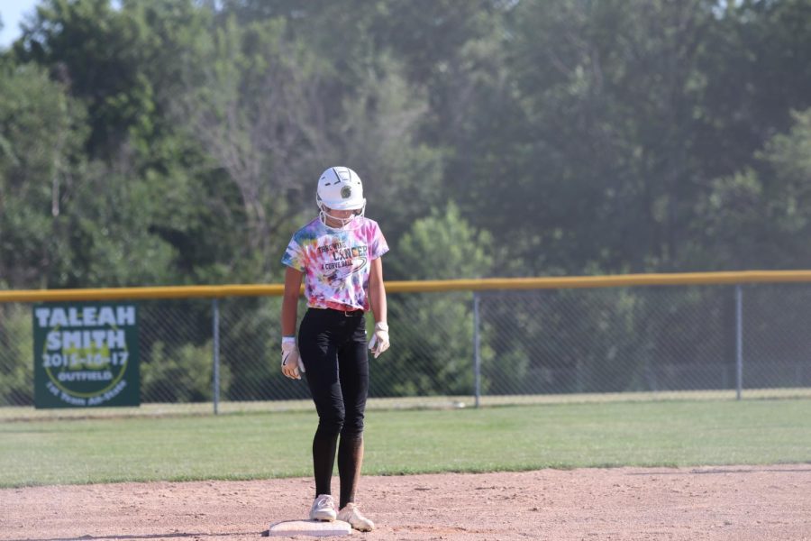 Ella Nelson 23 awaits the hit to run to third base on June 22, 2022.