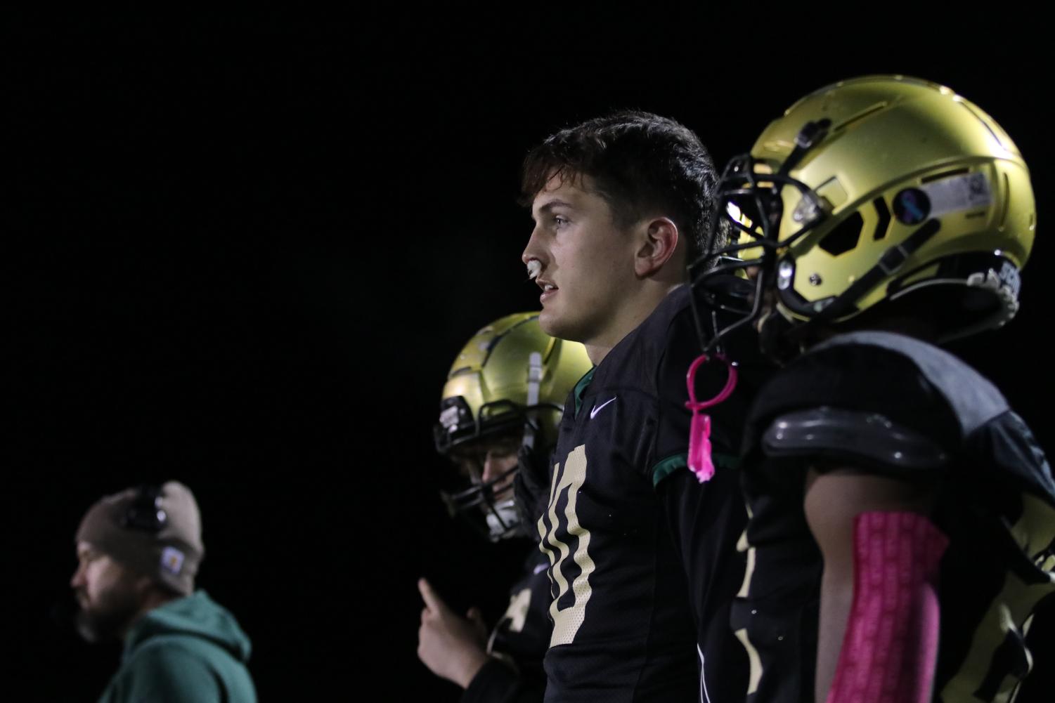 Jack Wallace '24 watches from the sideline vs. Prairie on Oct. 14, 2022.