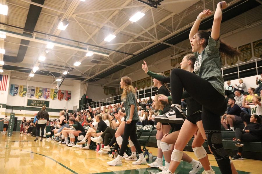 The bench celebrates junior Melae Laceys kill in the 3rd set of the volleyball match on Oct. 4, 2022. 