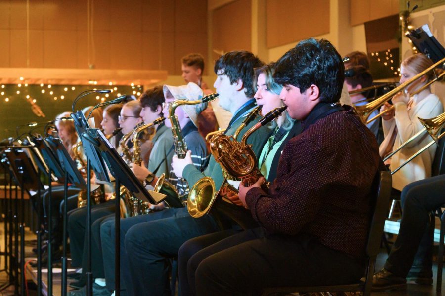 The Varsity Jazz Band saxophone section performs during the Jazz Cafe on Dec. 10.