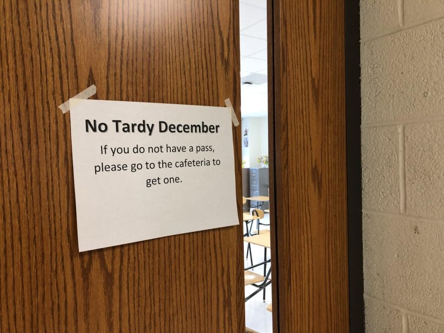Many classrooms at West High have posted signs on the outsides of their doors so students are reminded about the new tardy policy. 
