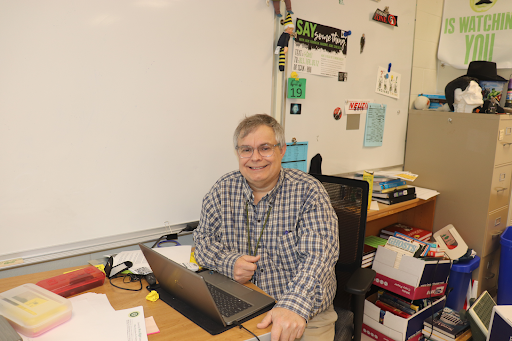 Mr. Neuzil, a social studies teacher at West High, announced his retirement earlier this year