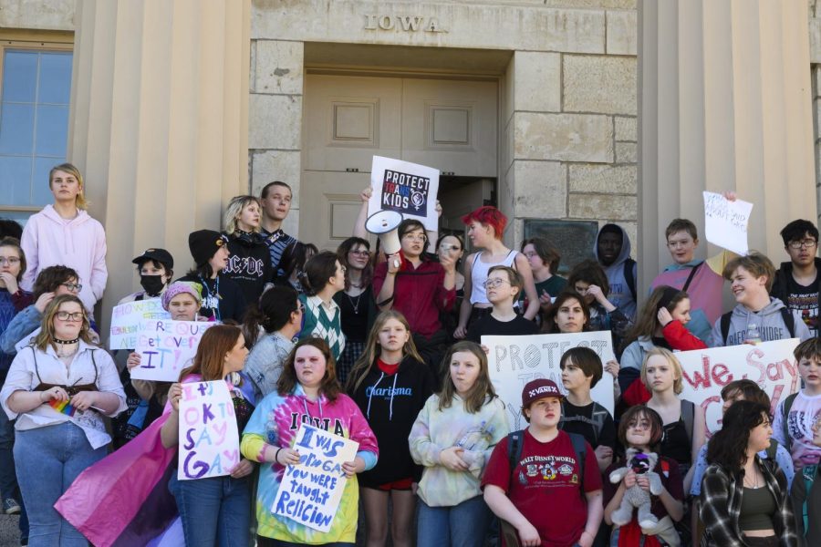 The protesters gathered on the front steps of the Old Capitol to begin the Pentacrest portion of the protest. 
