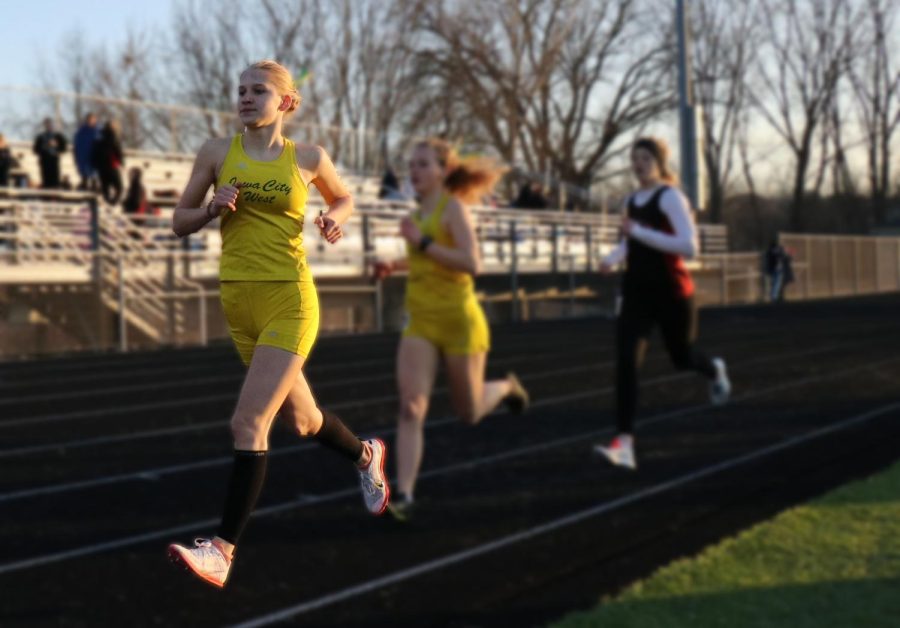 Kate Van Waning 26 finishes first in the 1,500-meter run March 28 at West. 