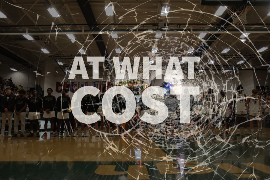 The boys basketball team stands behind broken glass.