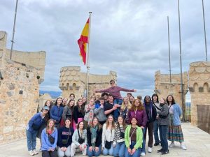 Students pose for a picture at the Alcazar de Segovia on the Spain trip. 