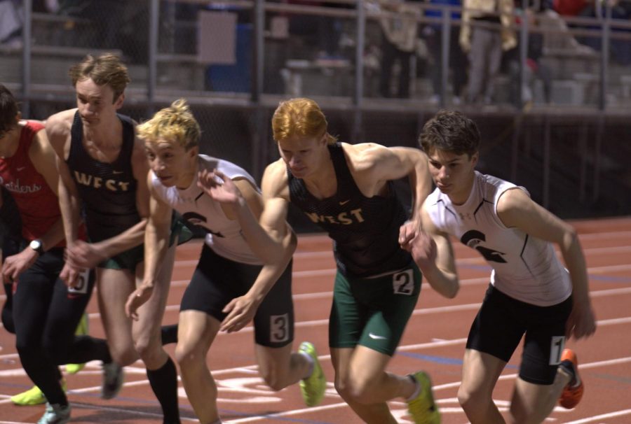 Mason Van Waning 23 leads the pack during the start of the 800 meter run.