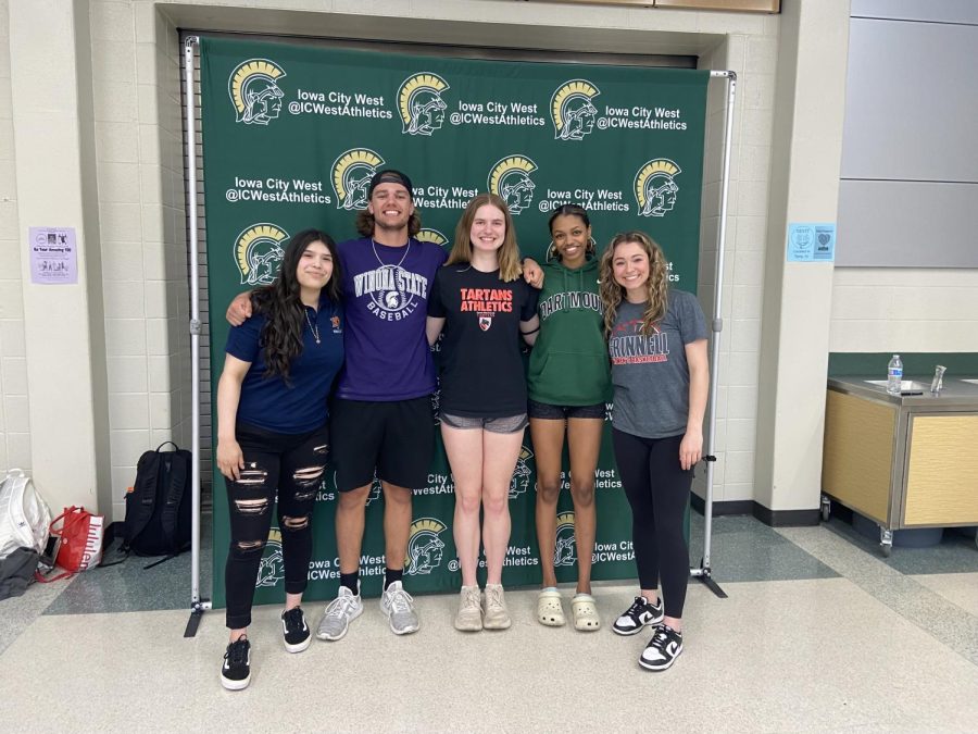 Seniors Jannell Avila, Mitch Frey, Anna Prouty, Meena Tate, Carolyn Pierce and Jay Mascardo (not pictured) signed their National Letters of Intent April 12.