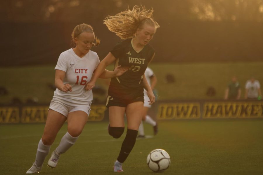 Emma Pottoff 25 fights for the ball at the City Double Header