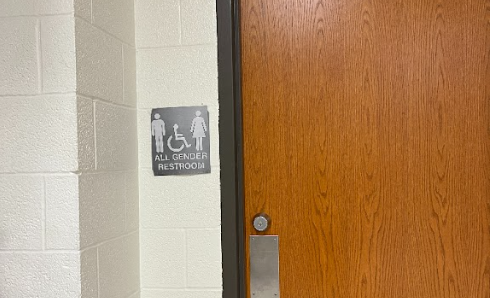 After the bill requiring students to use the bathrooms that align with the sex they were assigned at birth passed, some students at West covered restroom placards with all gender flyers in protest. 