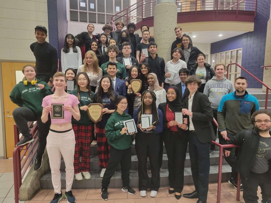 The West High Speech and Debate team poses with their awards at the East Iowa Districts tournament.