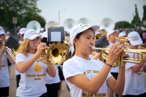 Erin Chen 27 plays Butter with the marching band. 