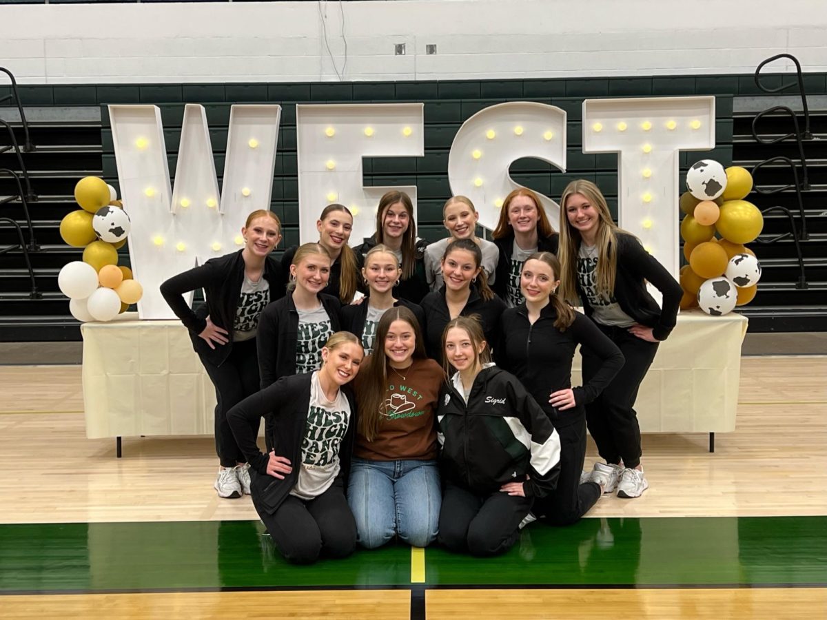 West High Dance Team poses for a team photo after holding their Wild West dance competition. 