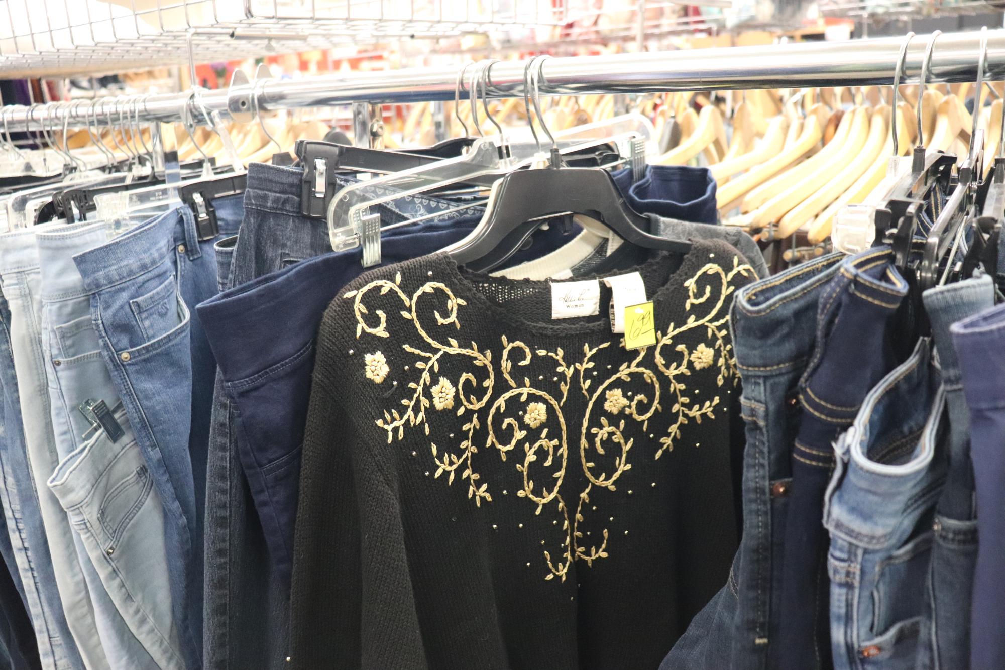 A sweater placed in the jeans section at the Salvation Army Family Store. 