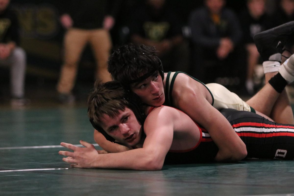 Dylan Colleran 26 attempts to turn his opponent on his back Dec. 7 against Western Dubuque. 