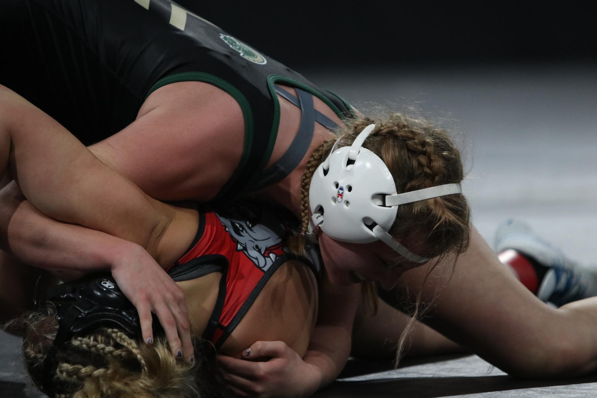 Helen Orszula 24 attempts to get her opponent on her back Nov. 30 on the first day of the Donnybrook tournament. 