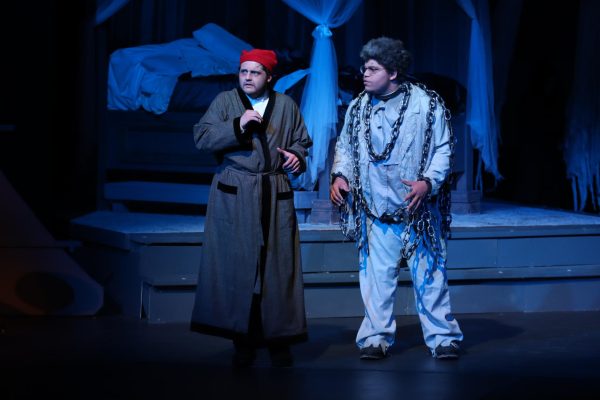 Seniors Andreas Warren and Xion Ownes-Holts perfom in A Christmas Carol.