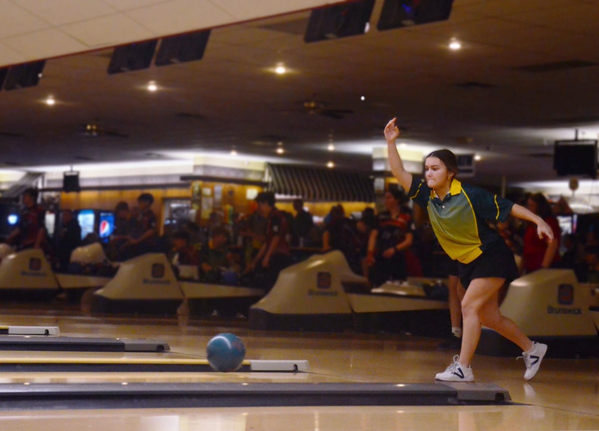 Rachel Wombacher-Hess '25 bowls a clean ball, finishing with a 240 series during the Battle for the Pins Feb. 9, 2024. 