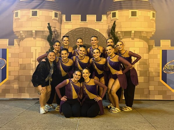 The West High Dance Team smiles for a picture after making it to the final round at UDA Nationals.