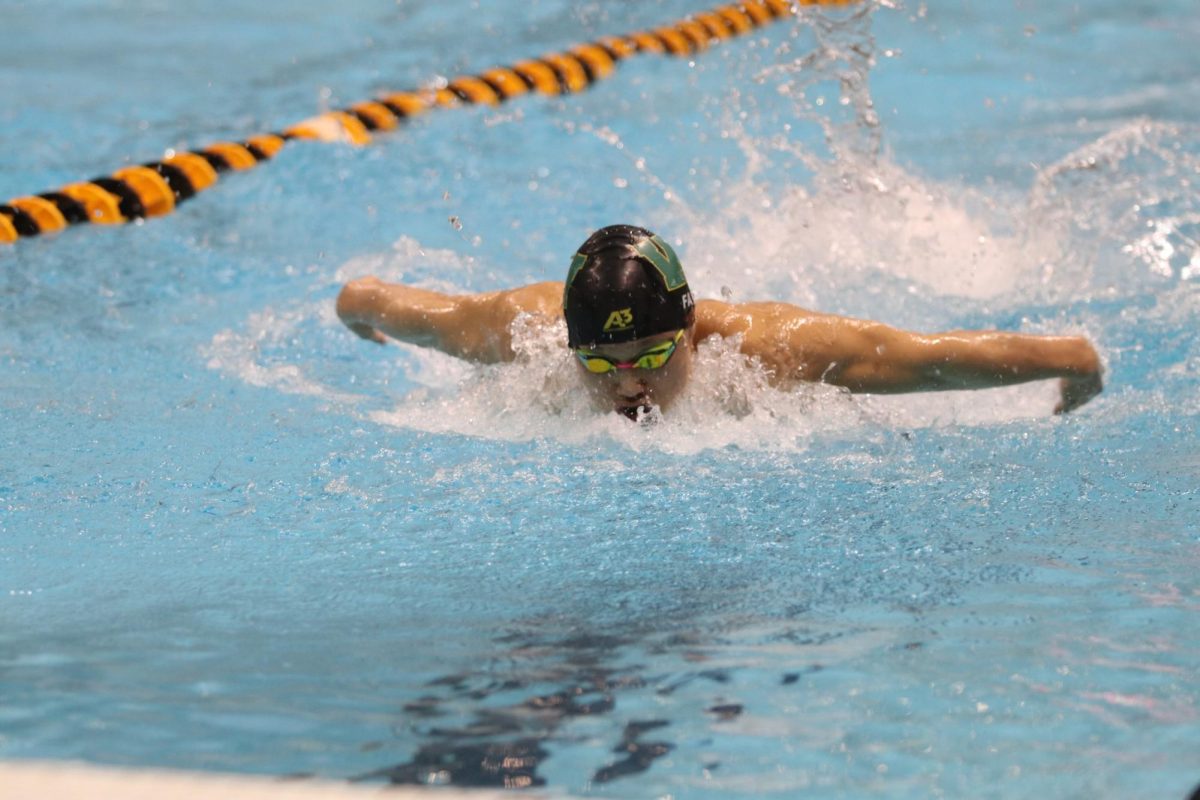 Winston Fan 26 finishes his last stretch of the Butterfly in the 200-yard Medley Individual Feb. 9.