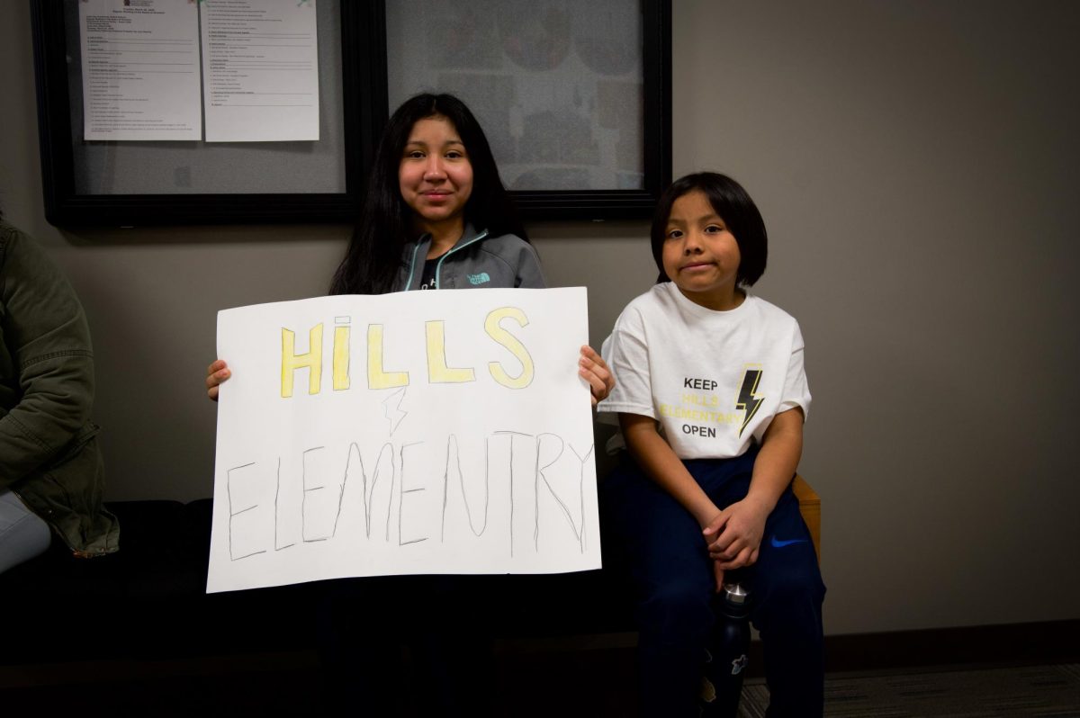 Hills+students+wait+for+the+school+board+meeting+to+begin+on+Mar.+26%2C+2024.