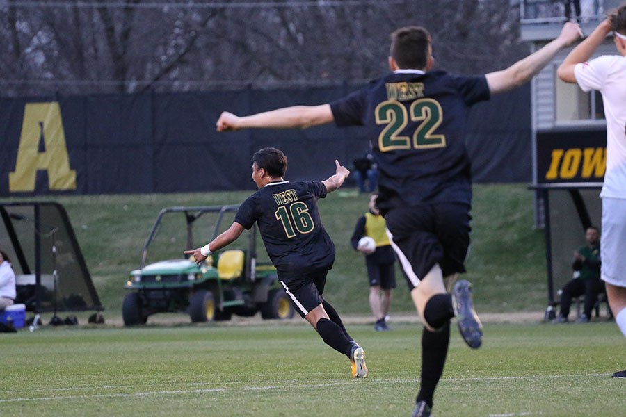 Tomas Sanchez 20 runs across the field to celebrate after scoring during the 2019 game. The boys won 1-0.