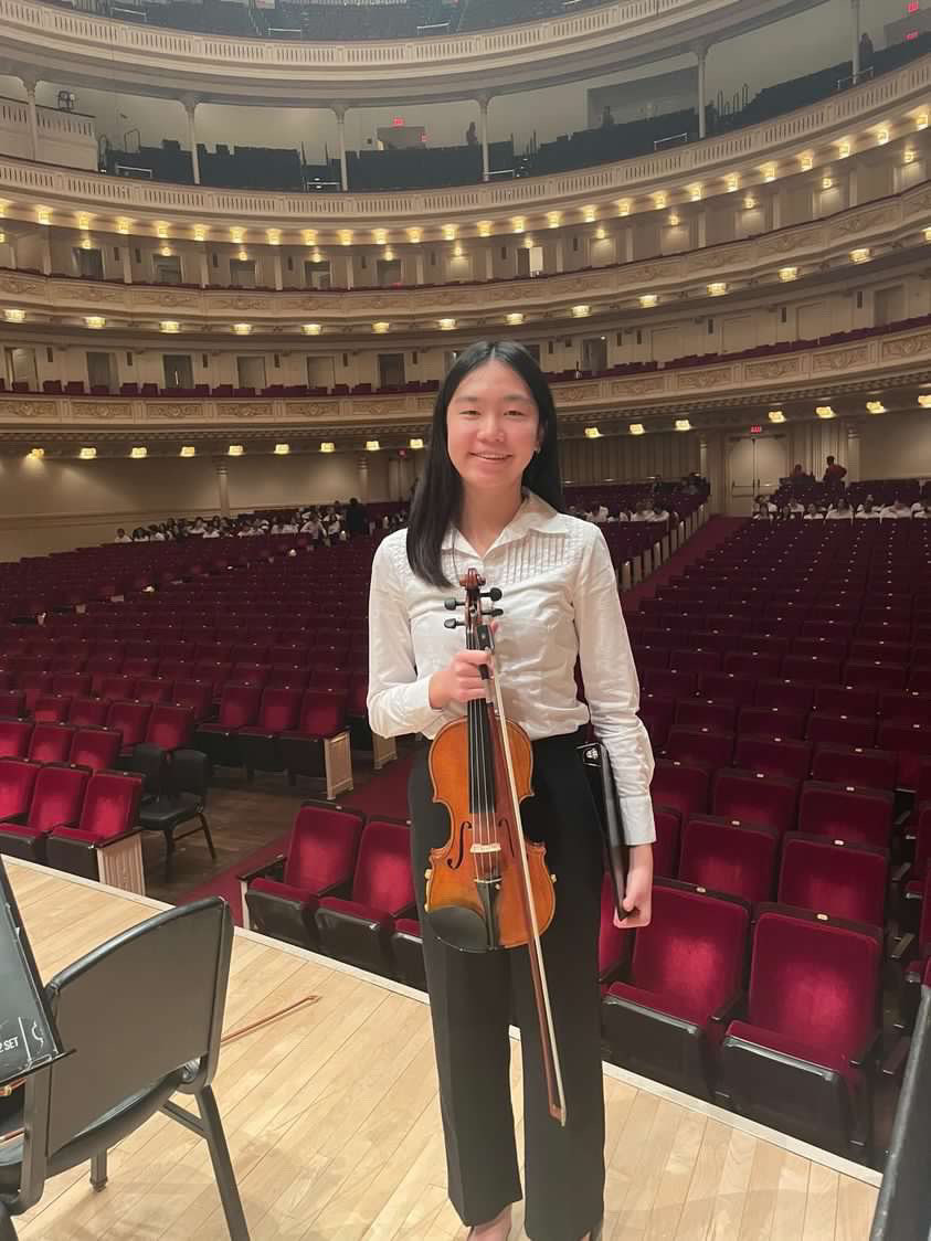 Sabrina Du 25 poses at Carnegie Hall, where she will played with other students across the United States. 
