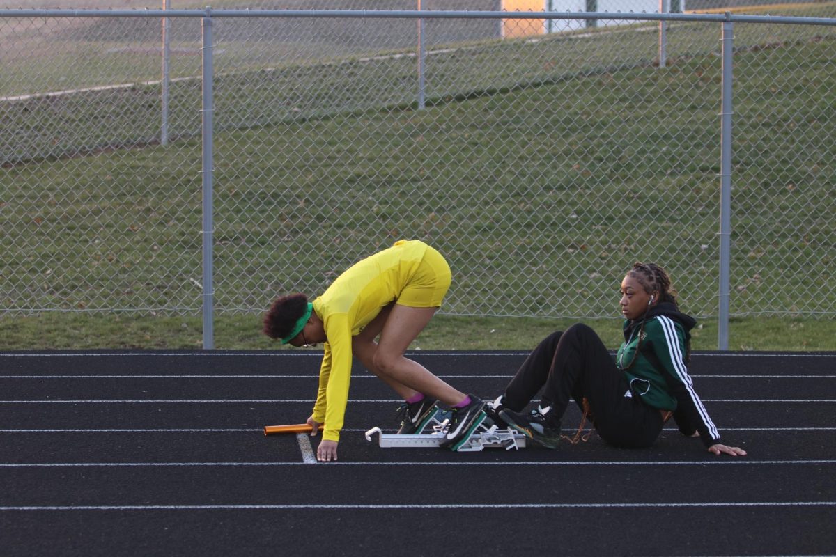 Miracle Stewart ’25 rises off the blocks to lead off the 4x100-meter relay. 