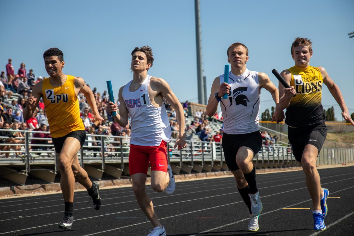 Teams from Center Point Urbana, Dubuque Senior, Solon and Clear Lake race against each other during a relay on April 13. 