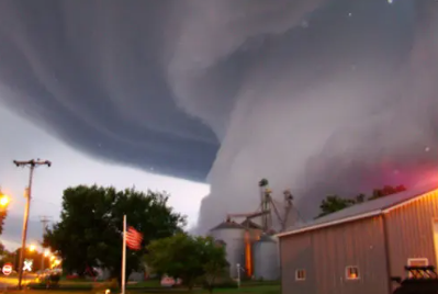 A violent tornado moving through the city of Orchard Iowa on 6/13/2008.
