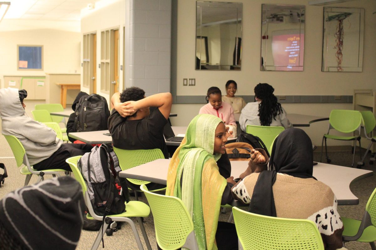 Students gathered at BSU meeting in the library