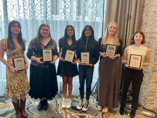 Seniors Jules Keranen, Liaison Eleanor Weitz, Co-presidents Zaira Ahmad, Kamakshee Kuchhal, and Lillian Graham, along with Liaison Dexter Hanna, proudly pose with their Youth Human Rights Awards May 22.