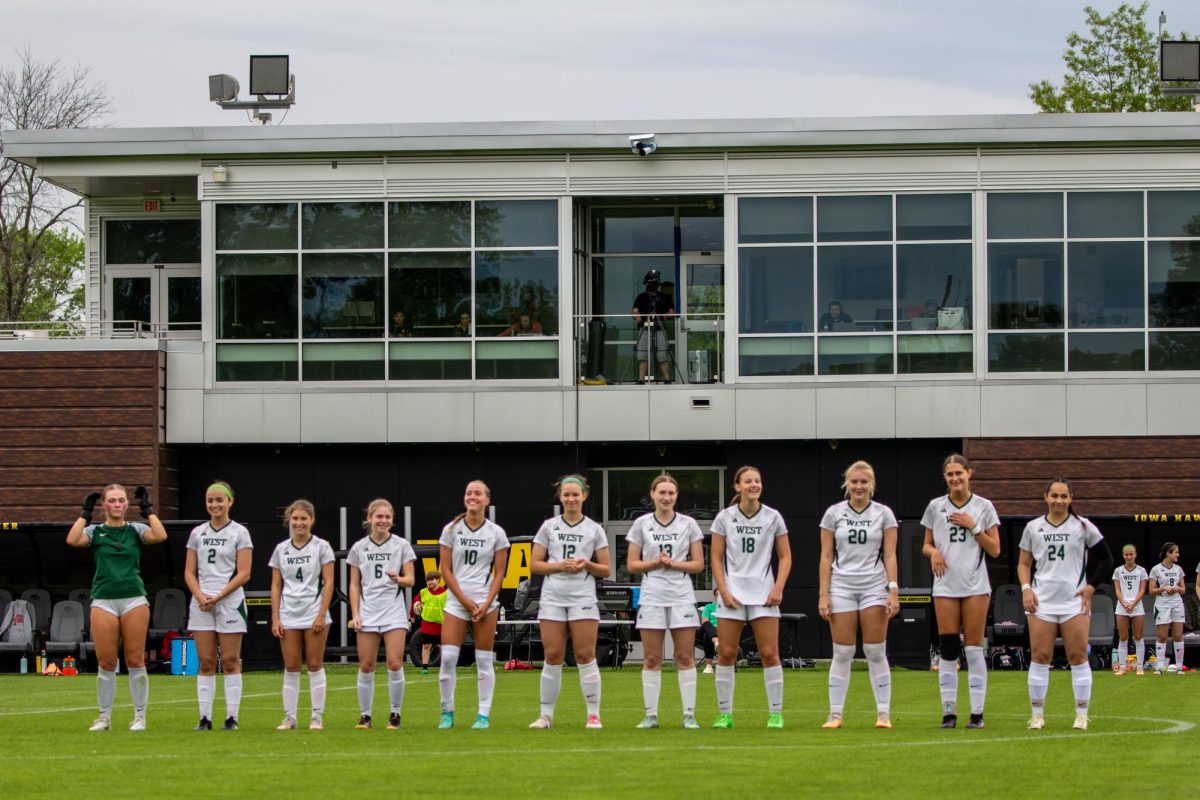 The girls soccer team lines up before their game against City High May 13.
