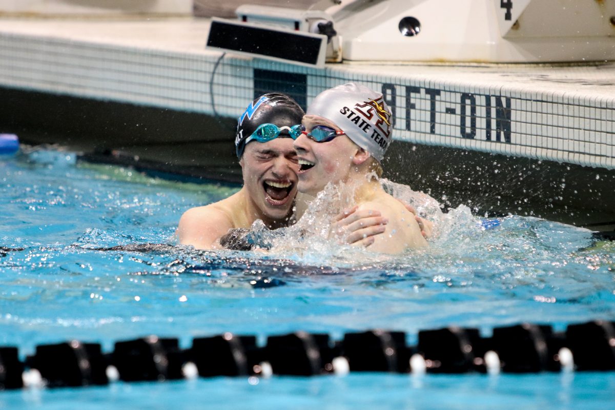 This photo, taken at the Boys Swimming and Diving State Tournament won first place sports feature photo for Gianna Liu. Liu was also named Iowas Photographer of the Year for 2024.