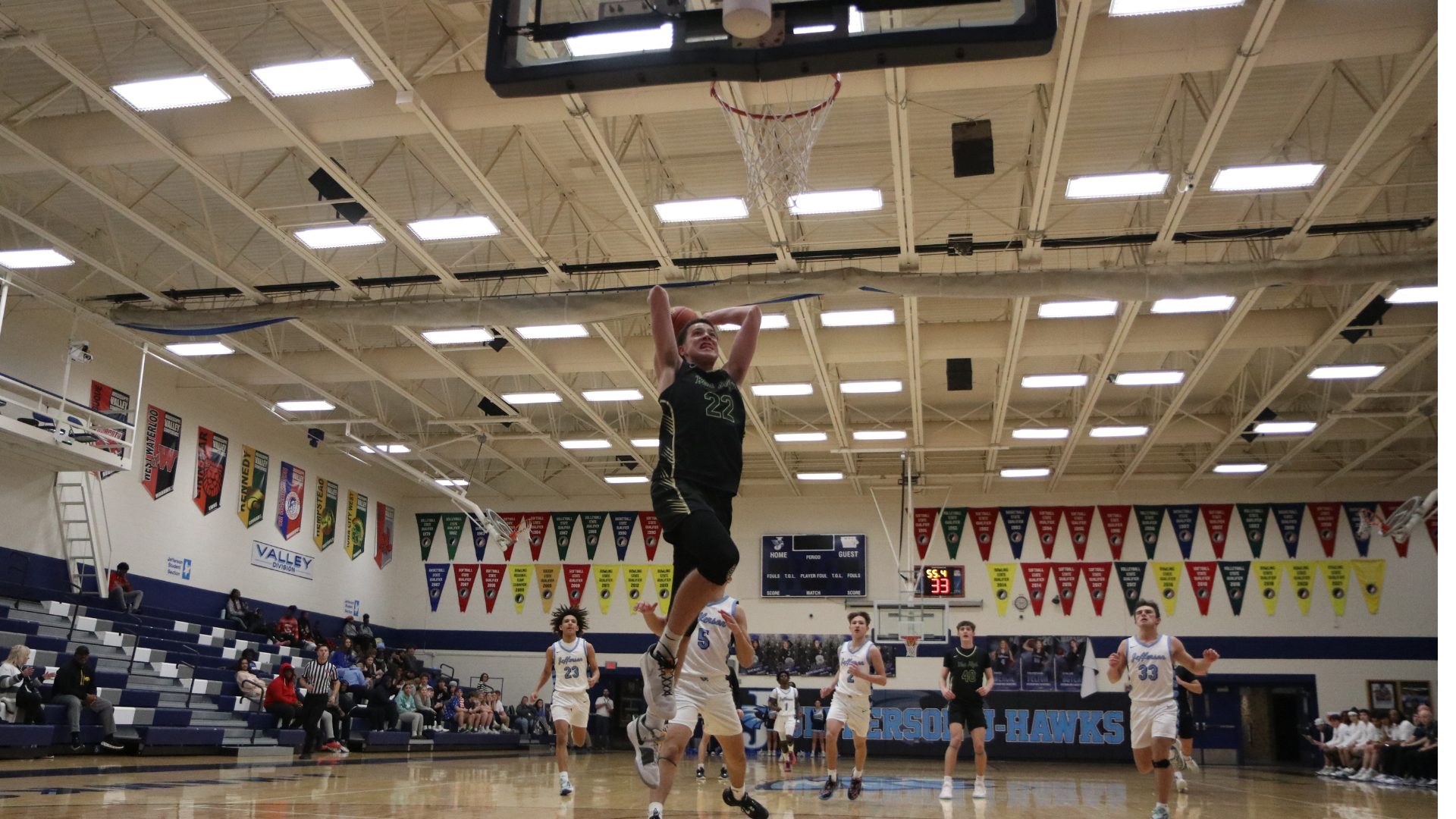 Jack McCaffery '25 jumps up for a shot