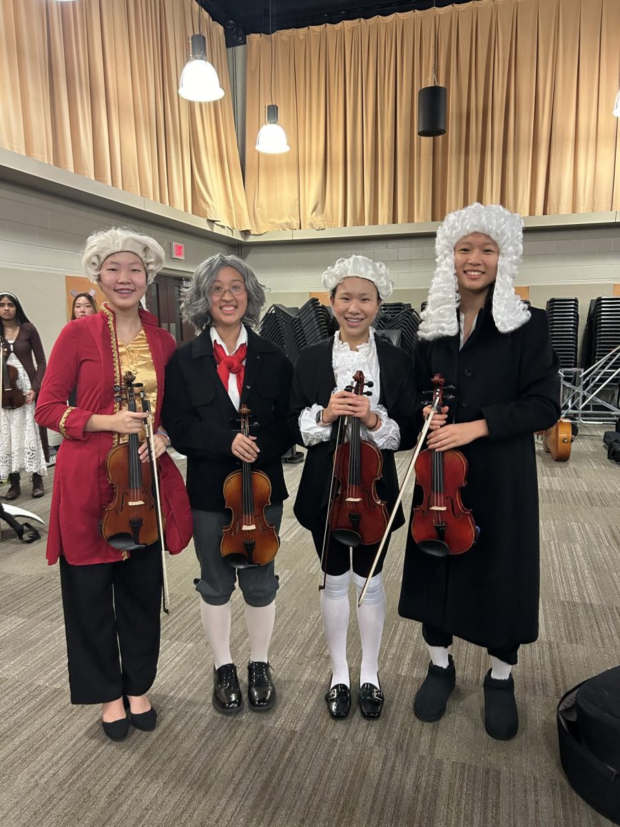 Abby Lee '27, Shannon Chen '27, Erin Chen '27 and Gracie Liu '27 dress up as musical composers. 