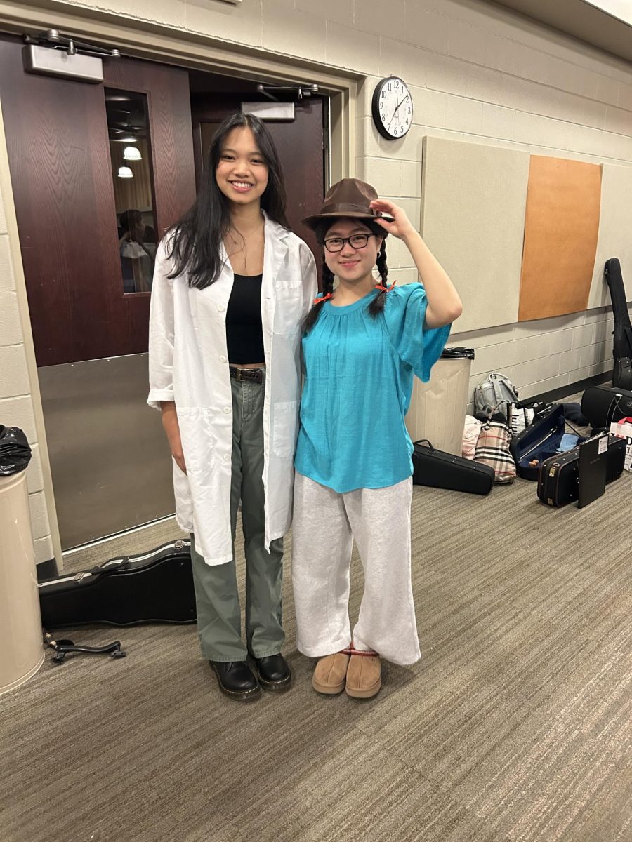 Anjali Lodh '25 and Anna Song '25 dressed up as Dr. Doofenshmirtz and Perry the Platypus from Phineas and Ferb. 