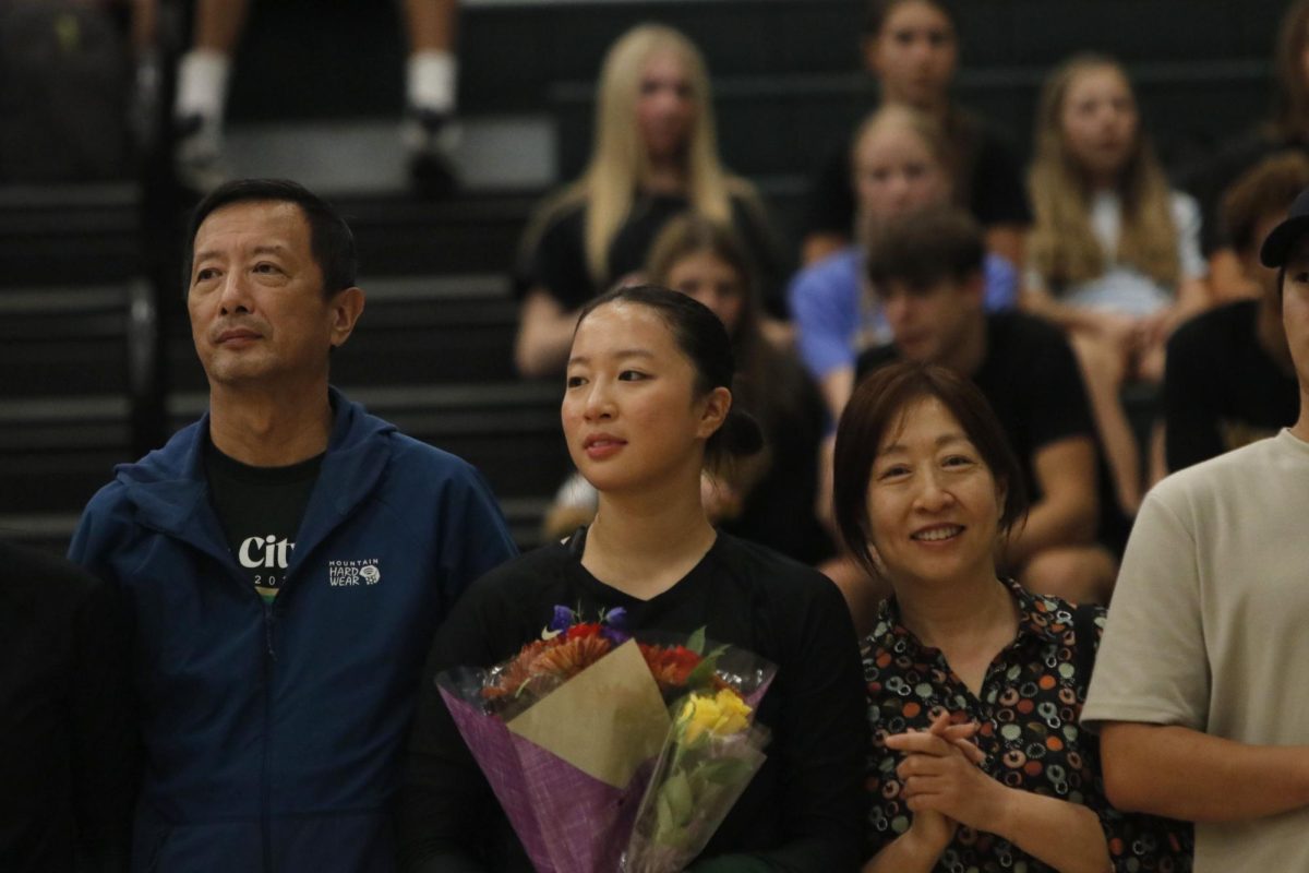 Gianna Liu ’25 is commemorated before the West High against City High volleyball match for West's senior night. 