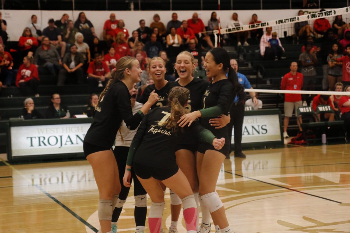 After winning the second set of the match, Lila Eastvold ’27 runs to her teammates to celebrate against City on Oct. 3. 