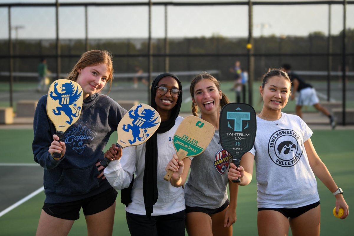 Juniors Audrey Crawford and Minna Abdalla, and sophomores Amaia Martinez and Kristy Kakizawa pose during the pickleball tournament.
