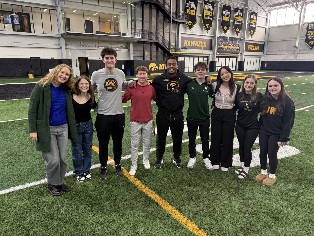 West journalists got to interview and photograph University of Iowa football players, including linebacker Nick Jackson, at media day on Nov. 19