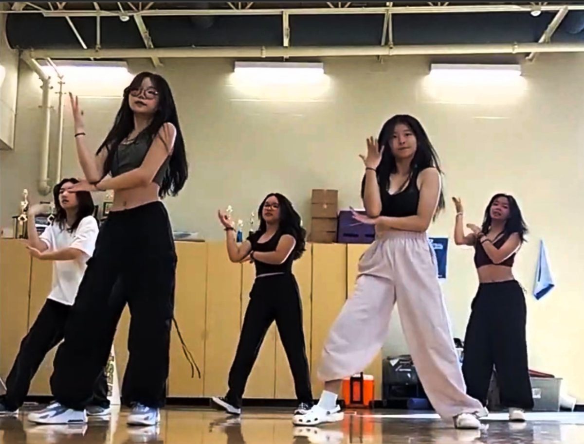 The Kpoppies dancing to “So Hot” by Blackpink. Back row: Abby Guo  '25, Khul Hyunh '27 and Ankia Nguyen '25 in the back. Front row: Jasmine Tsang '26 and Angela Kim '28. 