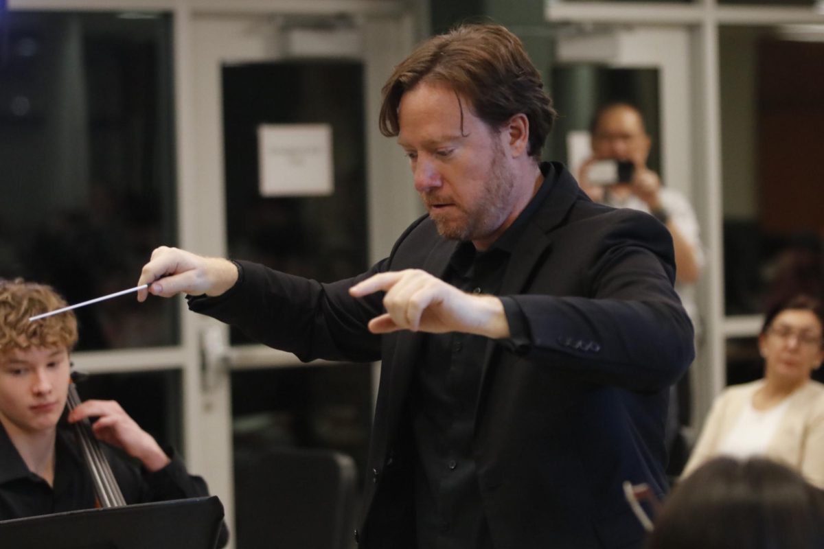 Orchestra director Jon Welch leads the Chamber Orchestra during "Palladio" by Karl Jenkins at the "Fall Fantasia" concert Nov. 15.