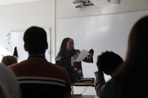 Camille Dungy '91, the 2024 winner of the Paul Engle Prize, reads her poem "Ceremony" to the creative writing class on Nov. 15. 