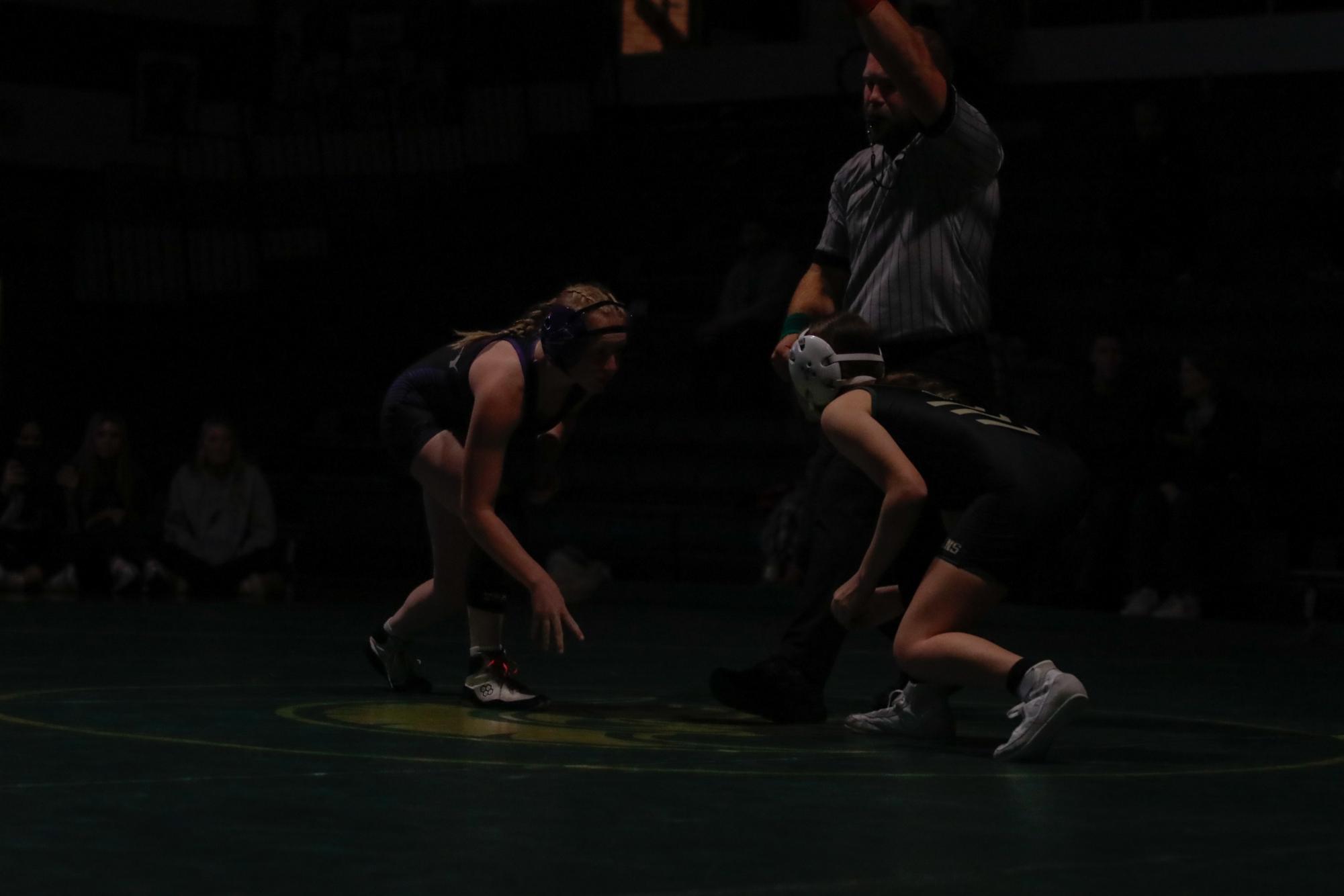 Jersey Naughton ‘28 faces her opponent as the referee blows the whistle.