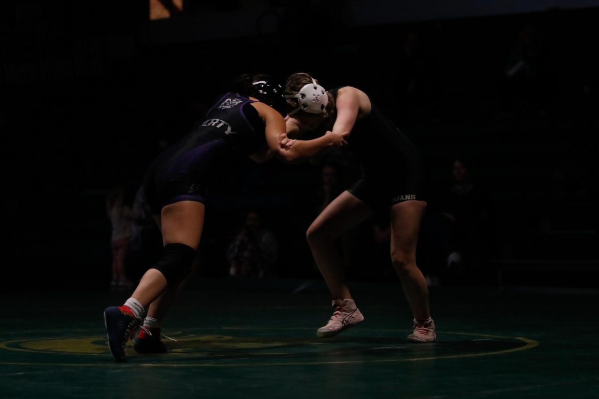 Xuvia Stevenson ‘25 sets up positioning, working for a takedown.