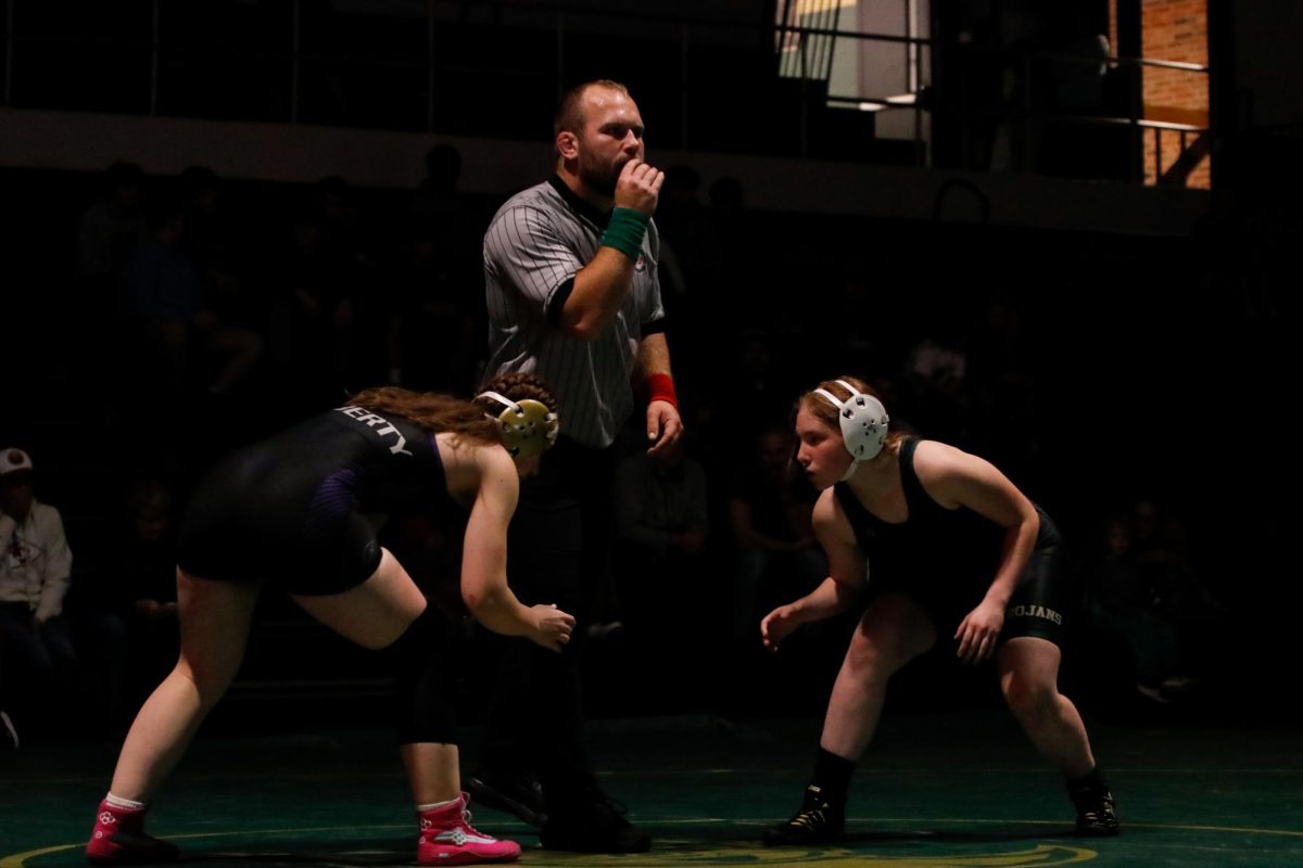 Ayla Bleil ‘28 prepares for the start of the match at 155 pounds.