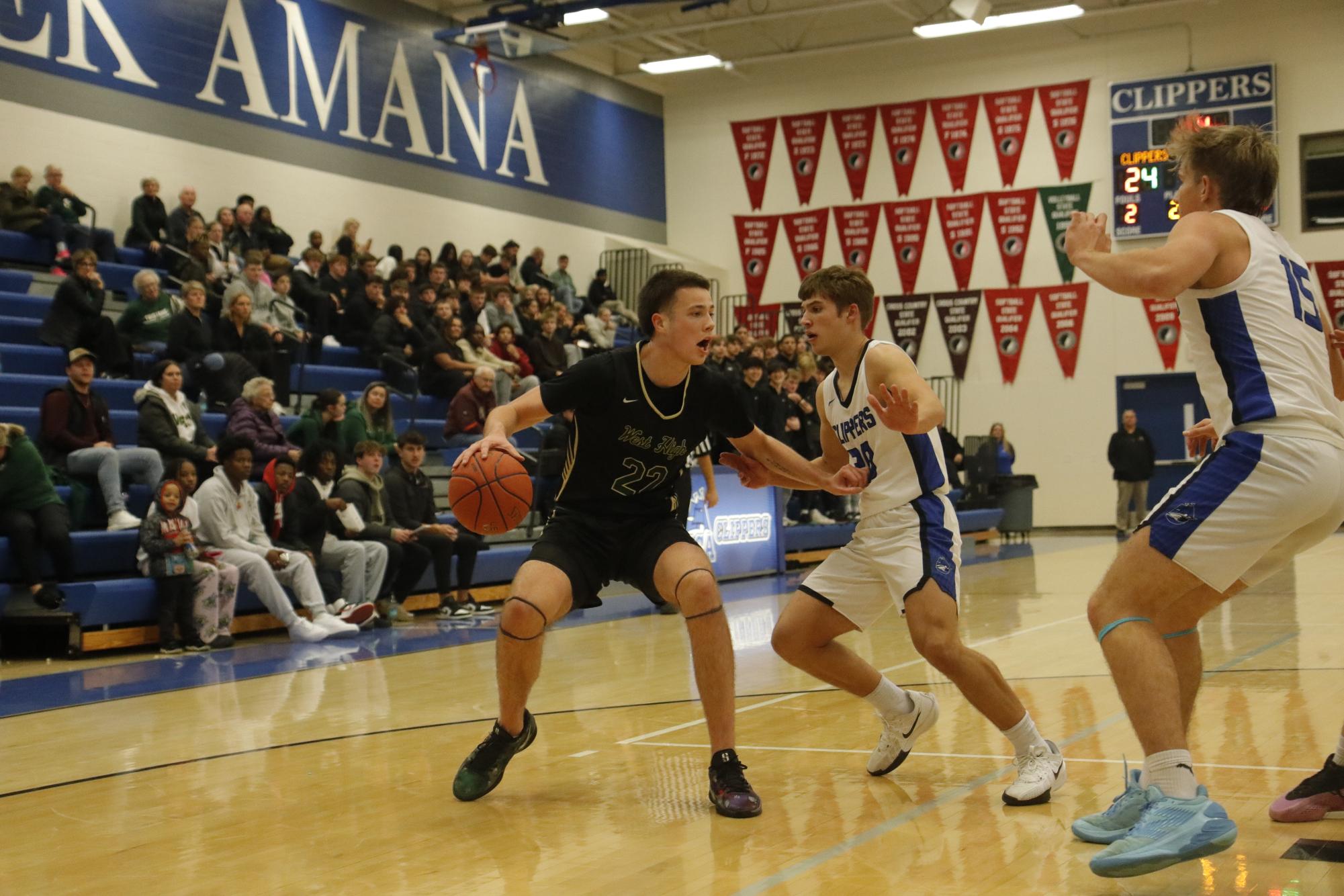 Jack McCaffery '25 defends the ball during the Clear Creek Amana game Dec. 3.